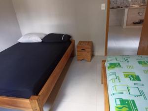 Postel nebo postele na pokoji v ubytování Chalés Cerrado de Piri