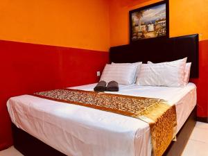 Letto o letti in una camera di Smart Budget Hotel - Klang