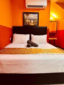 Letto o letti in una camera di Smart Budget Hotel - Klang
