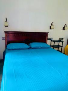 Llit o llits en una habitació de Bella Ella