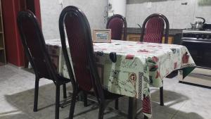 a table with a table cloth on top of it at Departamento céntrico SOL DE CUYO in San Juan