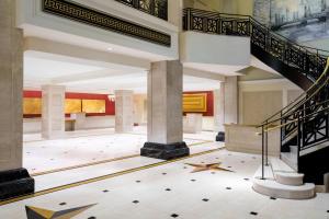 a lobby with a spiral staircase in a building at JW Marriott Chicago in Chicago