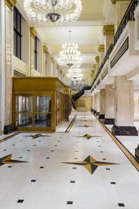 a large lobby with a floor with stars on it at JW Marriott Chicago in Chicago