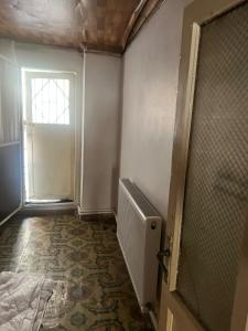 an empty room with a door and a window at Spacious House by the Sea in Gemlik