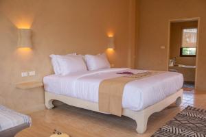 Ein Bett oder Betten in einem Zimmer der Unterkunft Casa Solana