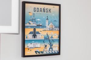 a framed poster of german cities and landmarks at Bright & Trendy Gdańsk Apartment with Balcony by Renters in Gdańsk