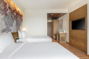 Dusit Princess Kathmandu客房内的一张或多张床位