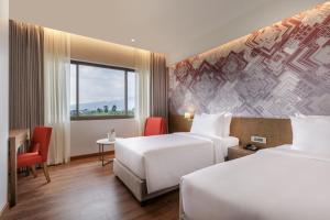 Dusit Princess Kathmandu客房内的一张或多张床位