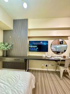 Μια τηλεόραση ή/και κέντρο ψυχαγωγίας στο Cozy Studio I.T. Park