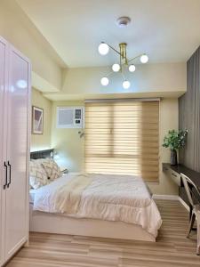 Ένα ή περισσότερα κρεβάτια σε δωμάτιο στο Cozy Studio I.T. Park +7 φωτογραφίες