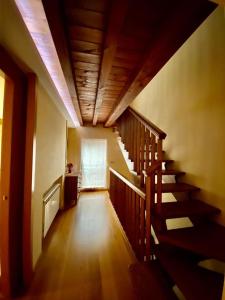 an empty hallway with stairs in a house at Casa Moneo in Briones