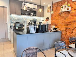 Η κουζίνα ή μικρή κουζίνα στο Aree House Poshtel