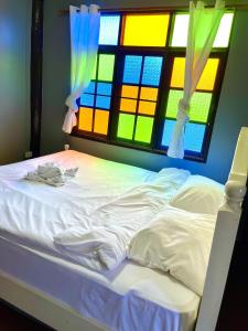 Postel nebo postele na pokoji v ubytování Ho Hostel