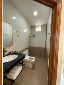 Koupelna v ubytování Quê Tôi 2 Hotel