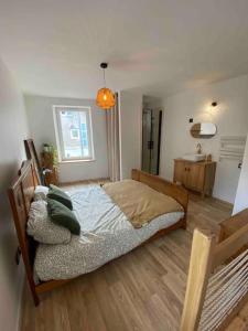 Postel nebo postele na pokoji v ubytování Petite maison de village