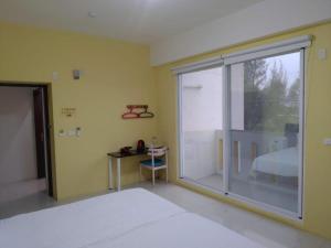 Postel nebo postele na pokoji v ubytování King X.S. B&B