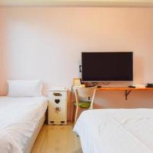Postel nebo postele na pokoji v ubytování King X.S. B&B