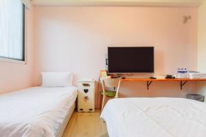 Postel nebo postele na pokoji v ubytování King X.S. B&B