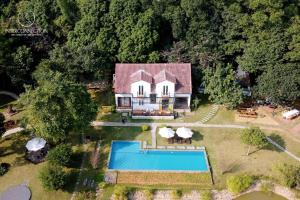 an aerial view of a house with a swimming pool at Interconnection Ba Vì Venuestay in Hanoi
