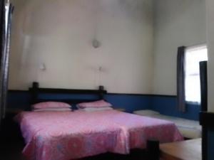 Postel nebo postele na pokoji v ubytování Marlothi Chalets