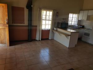 Kuchyň nebo kuchyňský kout v ubytování Marlothi Chalets