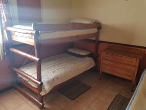 Postel nebo postele na pokoji v ubytování Marlothi Chalets