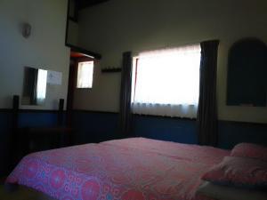 Postel nebo postele na pokoji v ubytování Marlothi Chalets