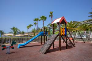 a playground with a slide and a slideintend at Hotel Riu Gran Canaria - All Inclusive in Maspalomas