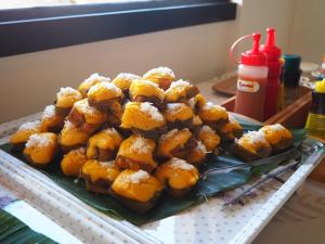 a platter of food on a table with a plate of food at Annowa Resort - Chanthaburi in Chanthaburi