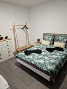 Ένα ή περισσότερα κρεβάτια σε δωμάτιο στο Appartement Hyper Centre Cosy avec Balcon