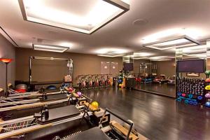 a gym with a bowling alley with pins and balls at Modern Luxury 17 Floor Panoramic Huge Corner Suite in Las Vegas