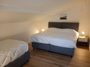 Ένα ή περισσότερα κρεβάτια σε δωμάτιο στο Maison/appartement proche Cala Rossa