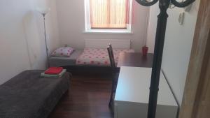 Posteľ alebo postele v izbe v ubytovaní Hostel Staromiejski