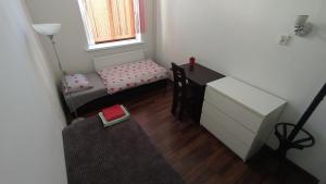 Posteľ alebo postele v izbe v ubytovaní Hostel Staromiejski