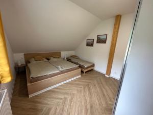 Postel nebo postele na pokoji v ubytování Černý Důl 292