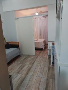 Letto o letti in una camera di Proximo a Ipanema e Arpoador,confortavel e util!