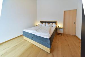 Alpenblick Appartements 객실 침대