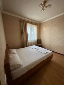 Postel nebo postele na pokoji v ubytování Giza + 24 fotografií
