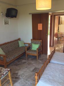Un lugar para sentarse en Apartments Rania