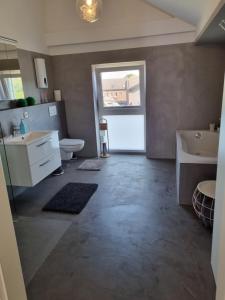 Koupelna v ubytování Ferienwohnung Emely + 20 fotografií