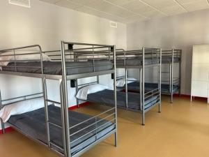 ALBERGUE A POBRA DO BROLLON客房内的一张或多张床位