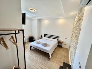 Postel nebo postele na pokoji v ubytování Sperlonga Sul Mare + 24 fotografií