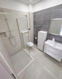 Kúpeľňa v ubytovaní Apartments Talija Podgora