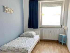 Postel nebo postele na pokoji v ubytování Apartments Hemer