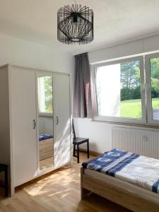 Postel nebo postele na pokoji v ubytování Apartments Hemer