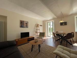 A seating area at Tenuta Dei Vicini - Luxury Apartments