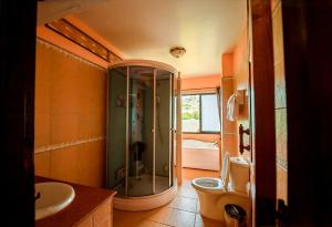 Koupelna v ubytování ดอยหมอกดอกไม้รีสอร์ท DoiMok DokMai Resort + 37 fotografií