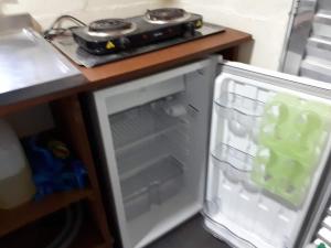 Mini casa (kit net)にあるキッチンまたは簡易キッチン