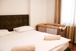 Postel nebo postele na pokoji v ubytování Dilijan Dream House 1