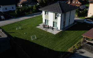 an overhead view of a house with a lawn with soccer nets at Happy Nest in Göstling an der Ybbs